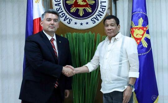 Cory Gardner with mass-murderer, Rodrigo Duterte